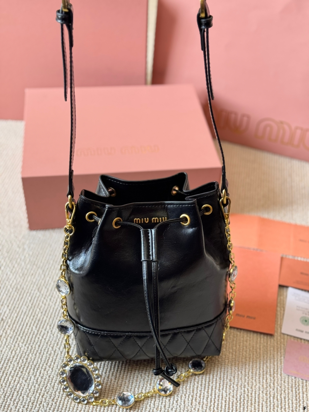 MiuMiu waxed leather small bucket bag