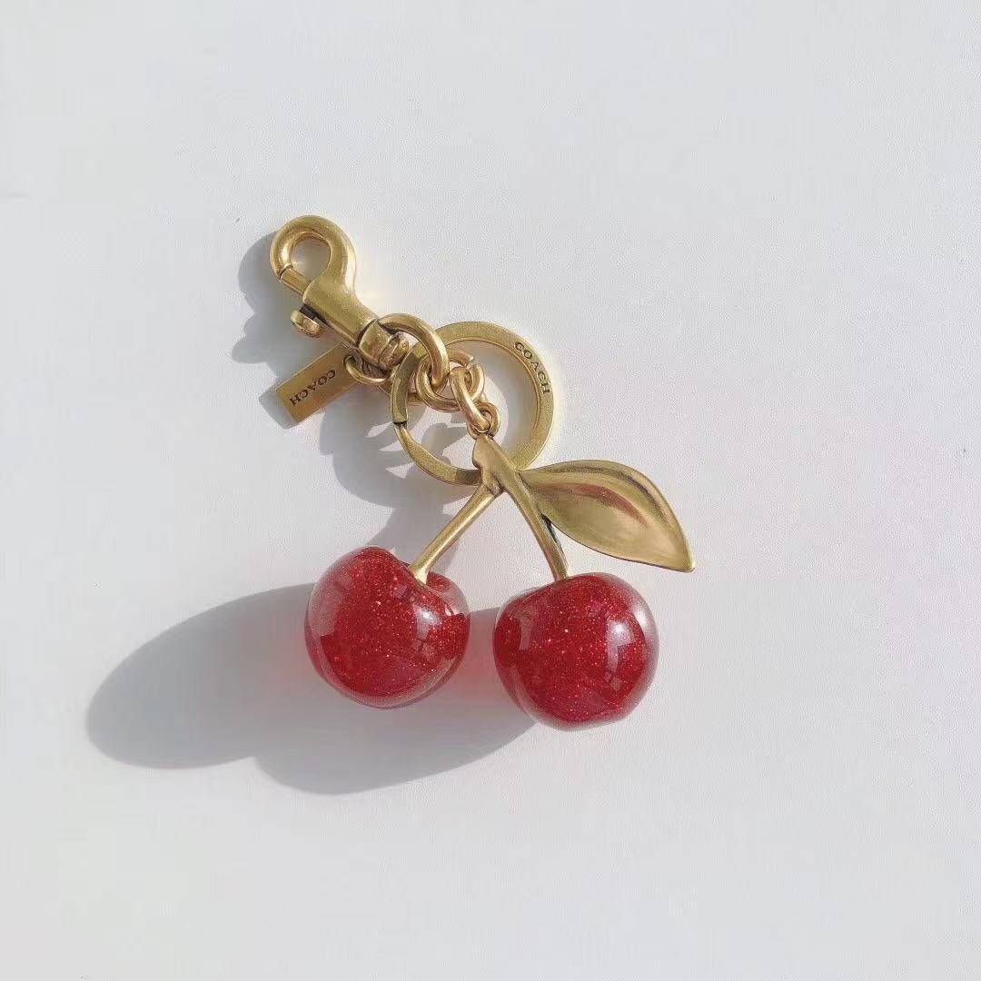 Coach cherry keychain