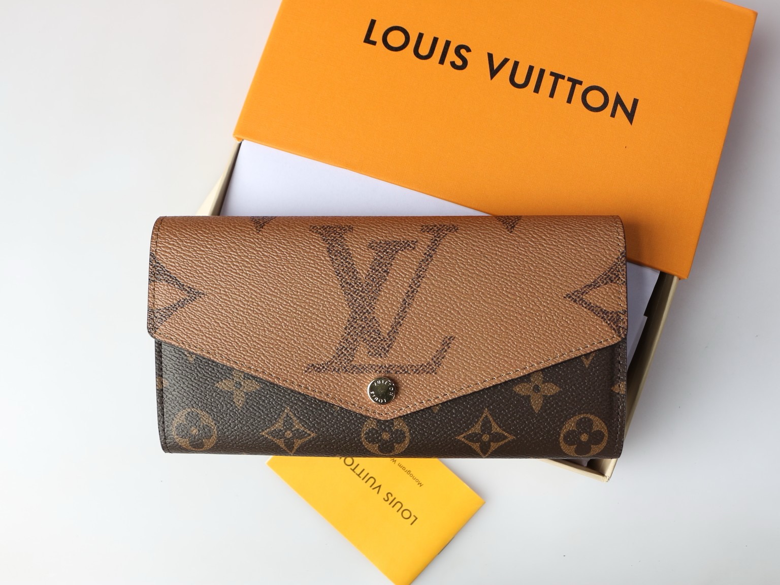 LV wallet square envelope style imprinted snap button