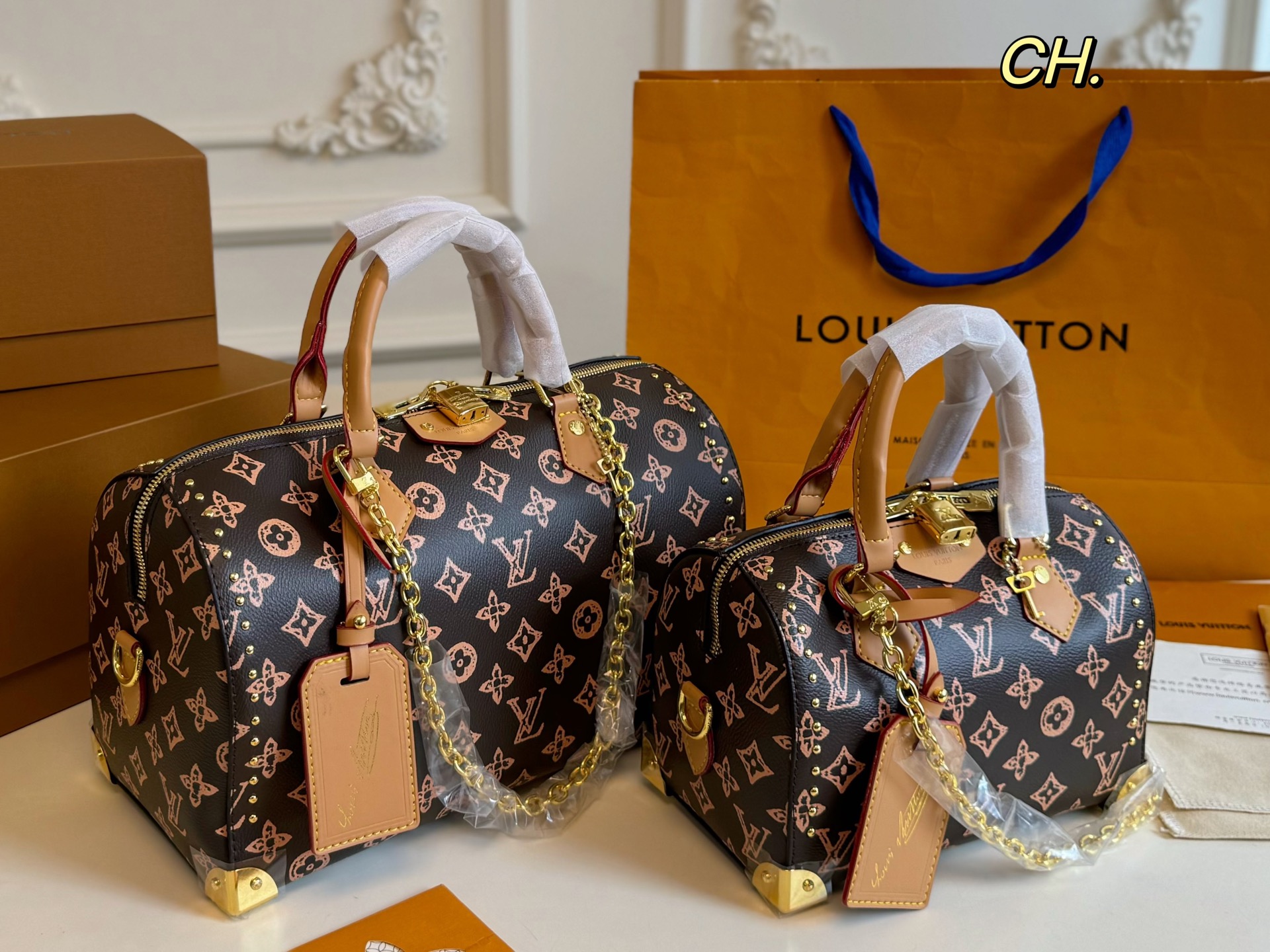 Louis Vuitton studded Speedy Boston pillow bag