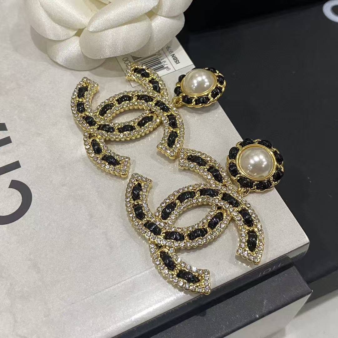 Chanel letter pearl stud earrings