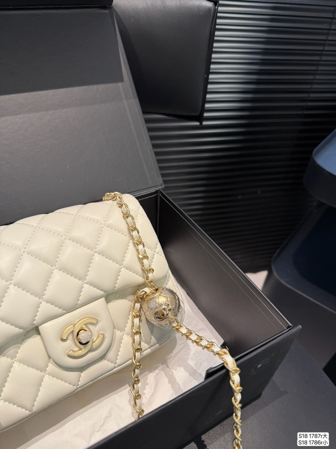 Chanel gold ball bag