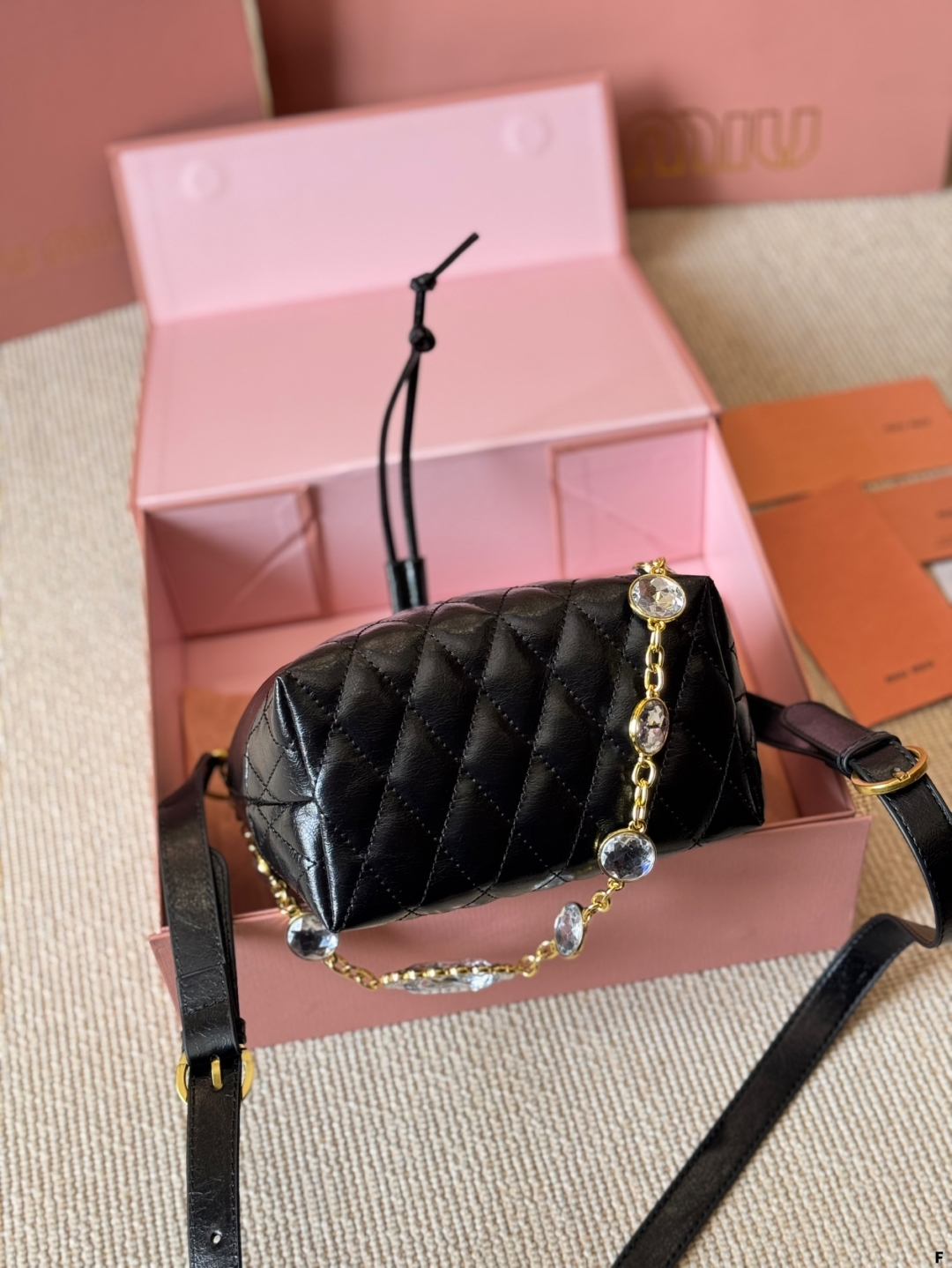 MiuMiu waxed leather small bucket bag