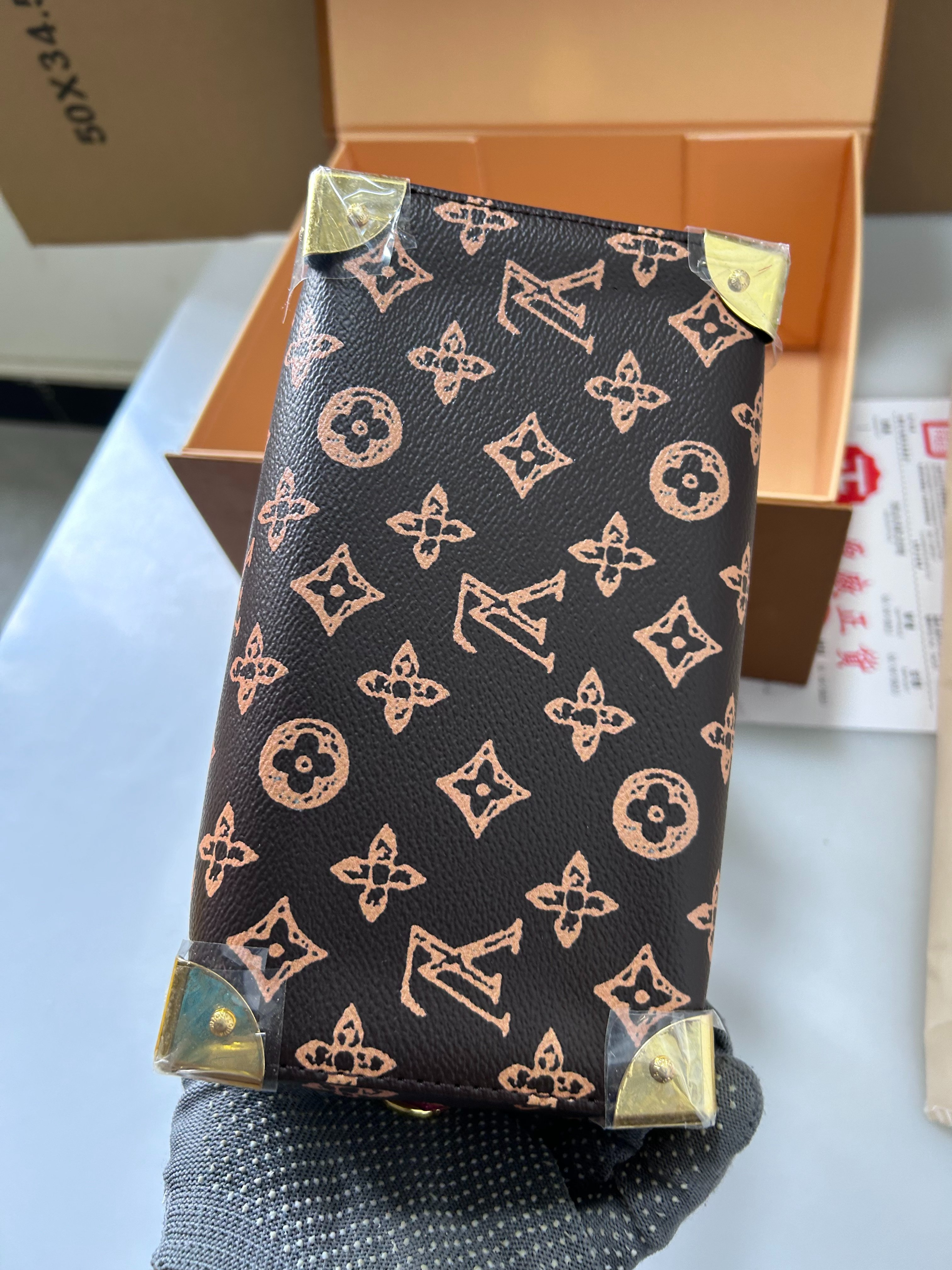 Louis Vuitton studded Speedy Boston pillow bag