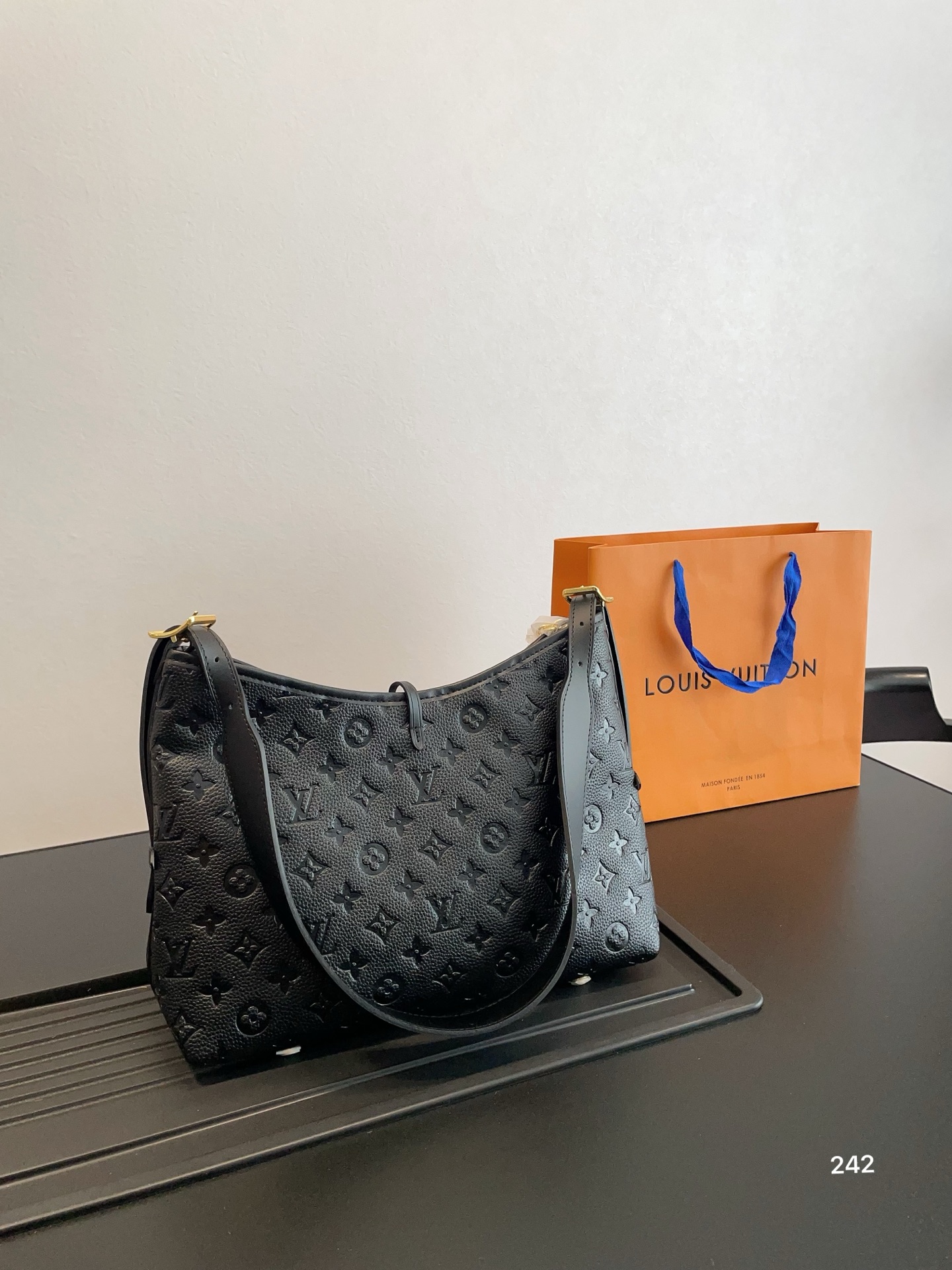 Lv Carryall commuter bag