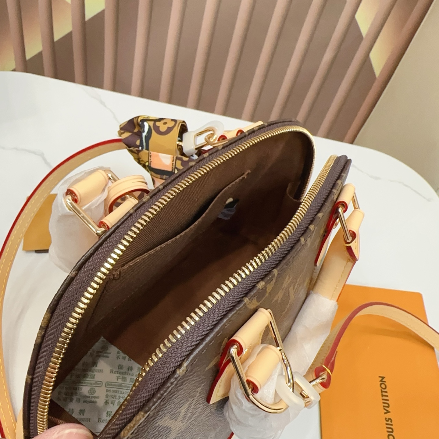 Louis Vuitton LV alma bag shell shoulder retiro bag