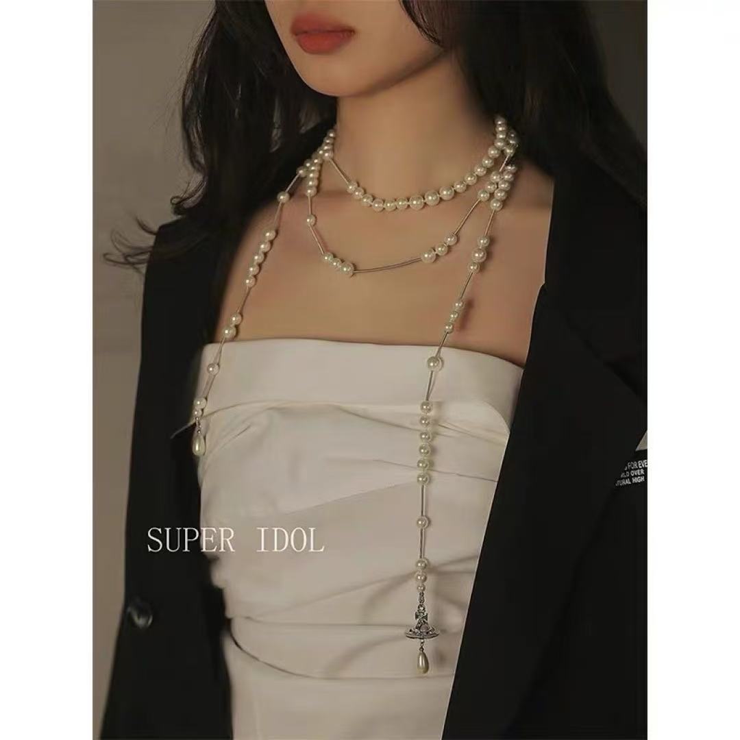 Vivienne Westwood asymmetrical three-dimensional pearl pendant necklace