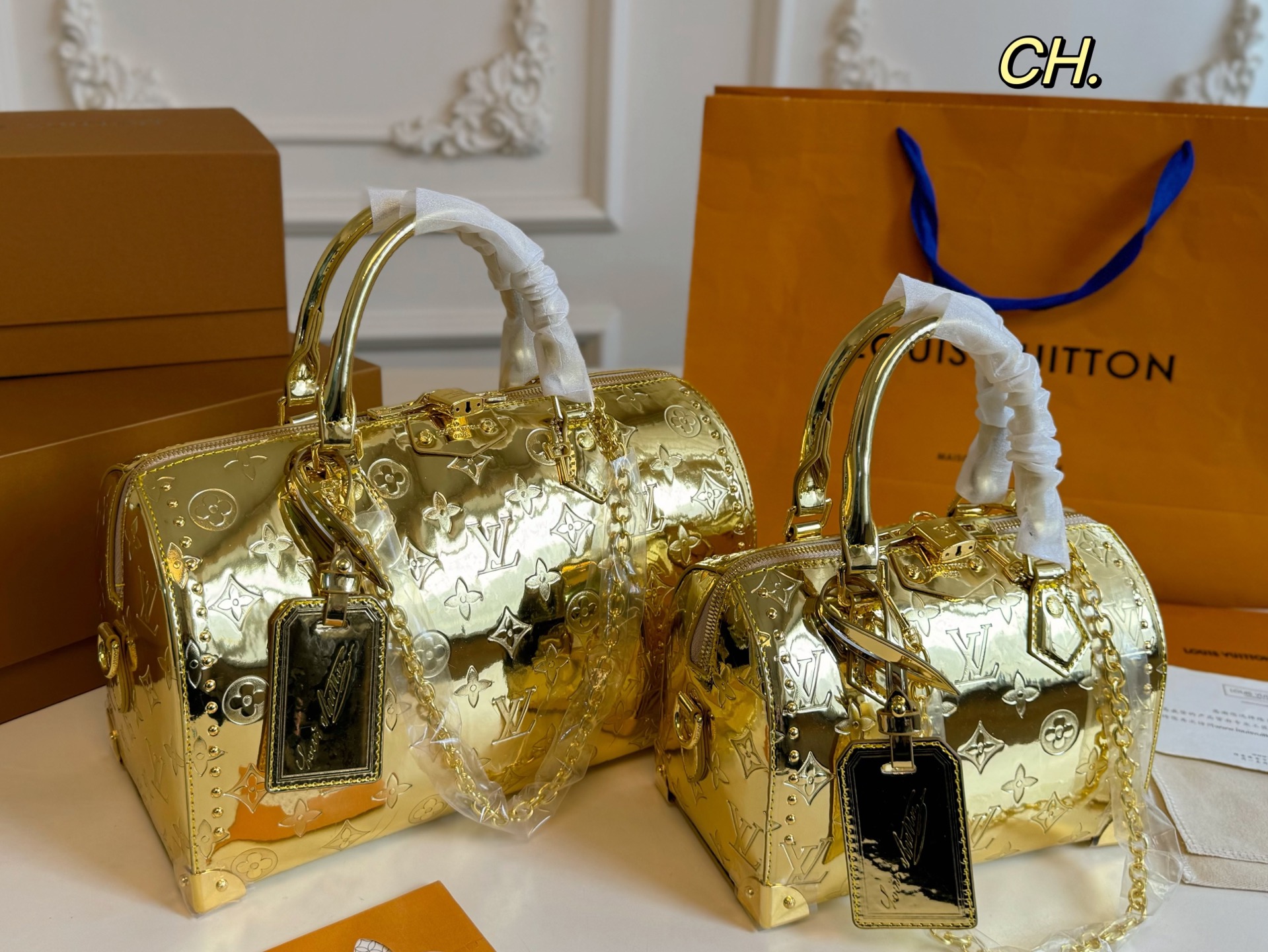 Louis Vuitton studded Speedy Boston pillow bag
