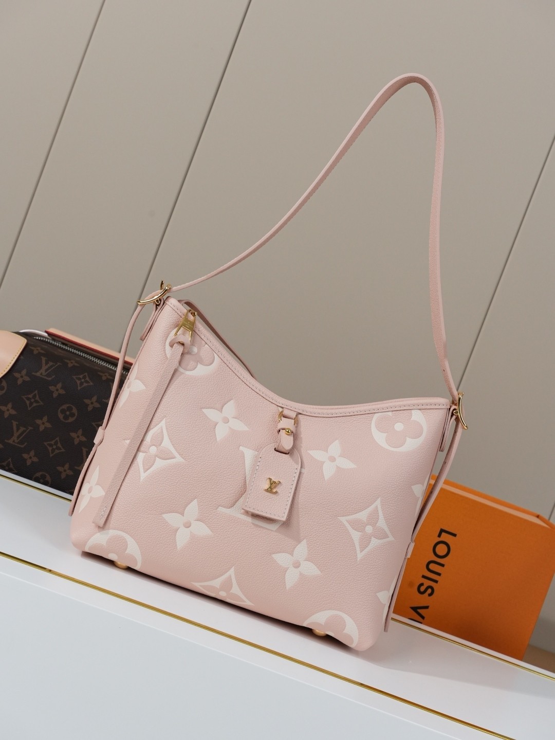 LV CarryAll Monogram Emeinte Milky Way handbag