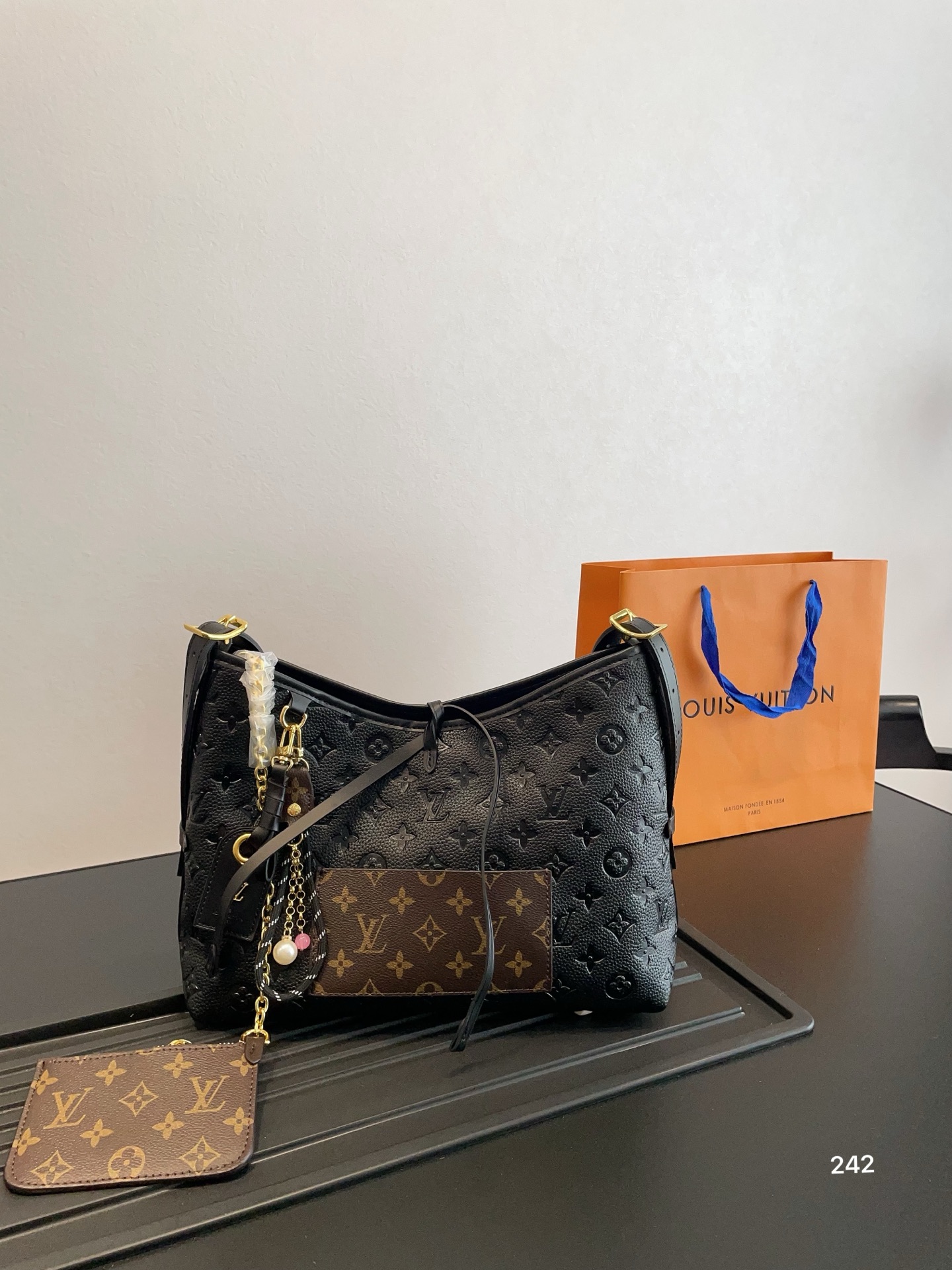 Lv Carryall commuter bag