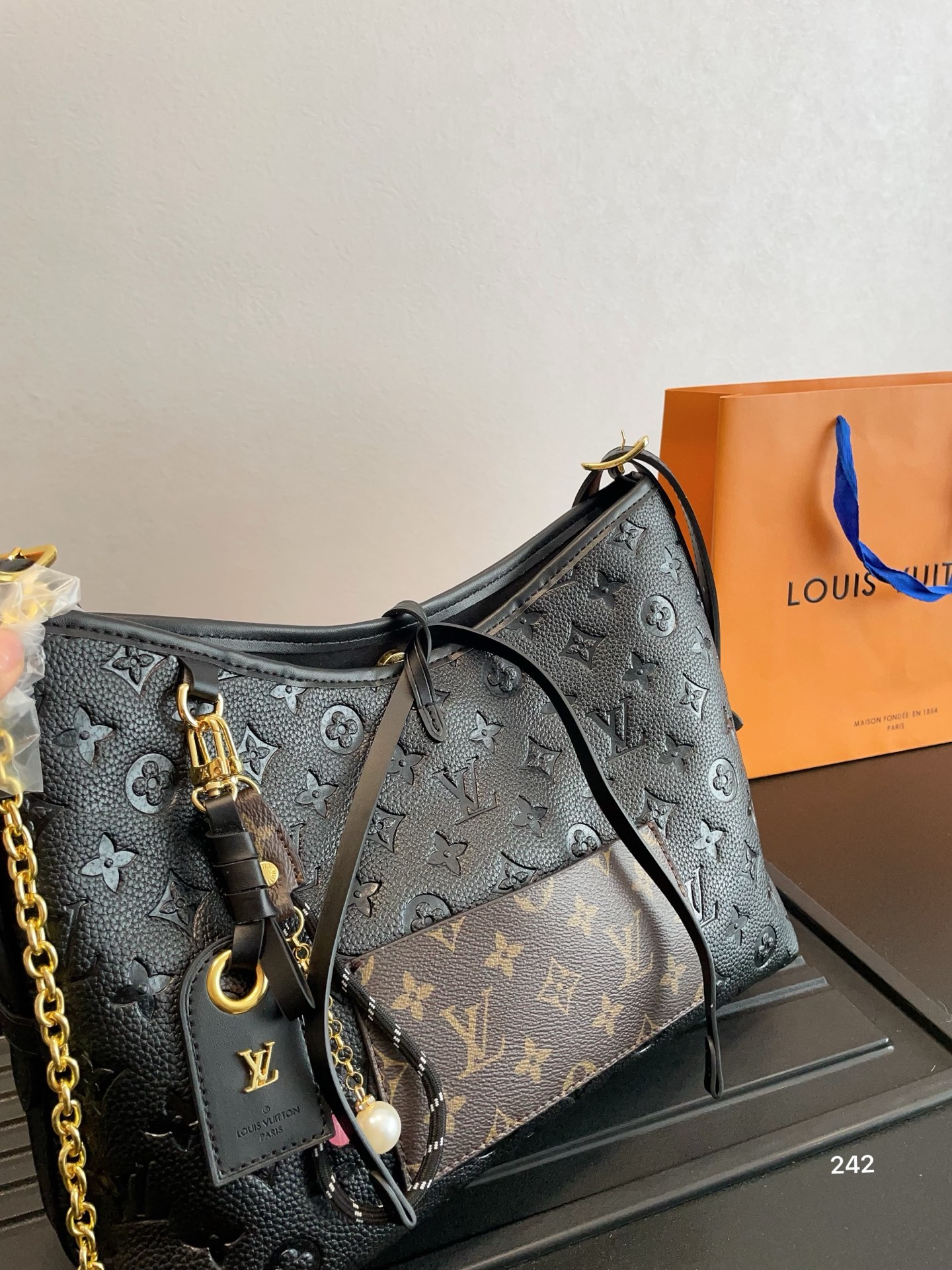 Lv Carryall commuter bag