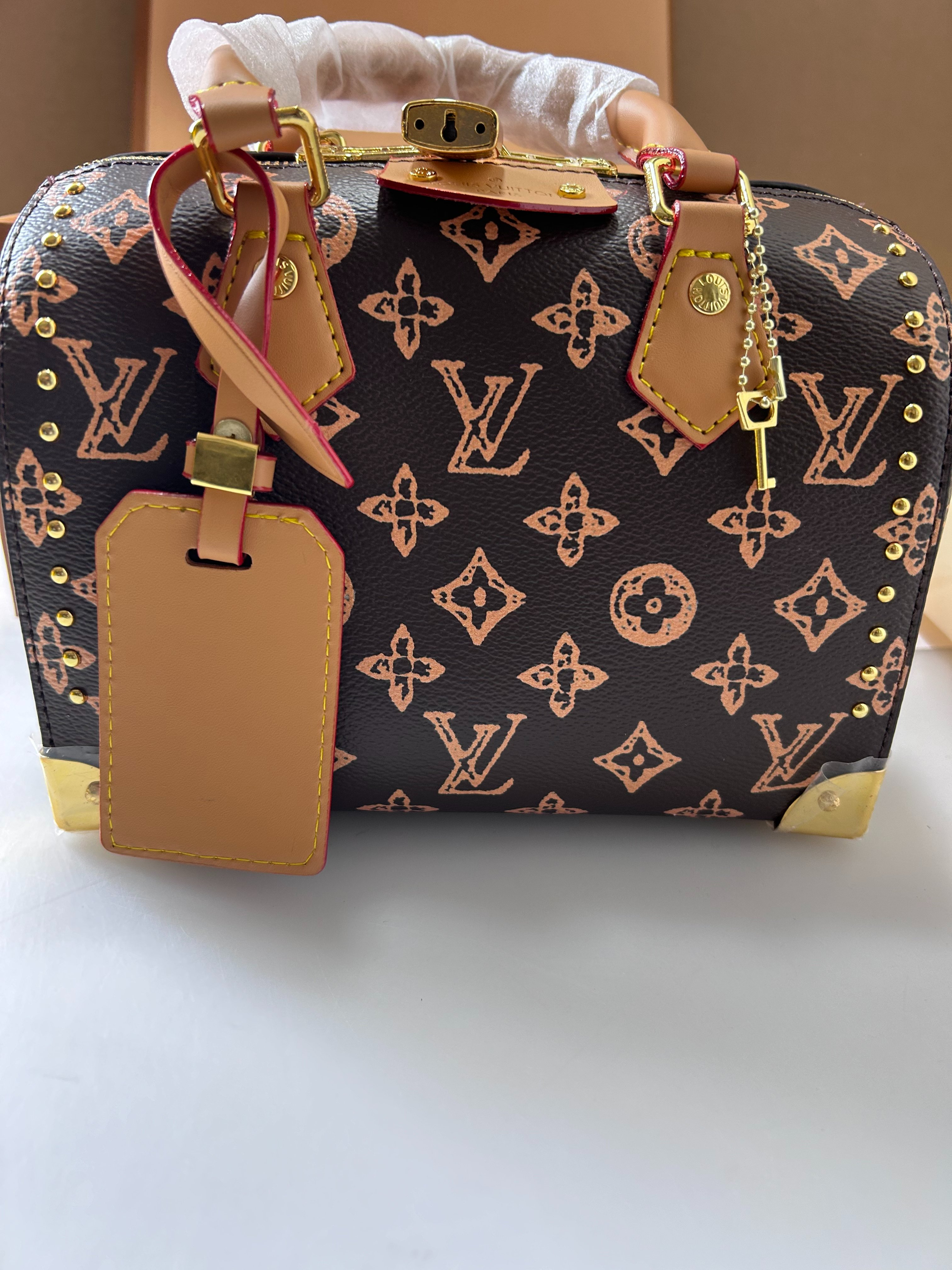 Louis Vuitton studded Speedy Boston pillow bag