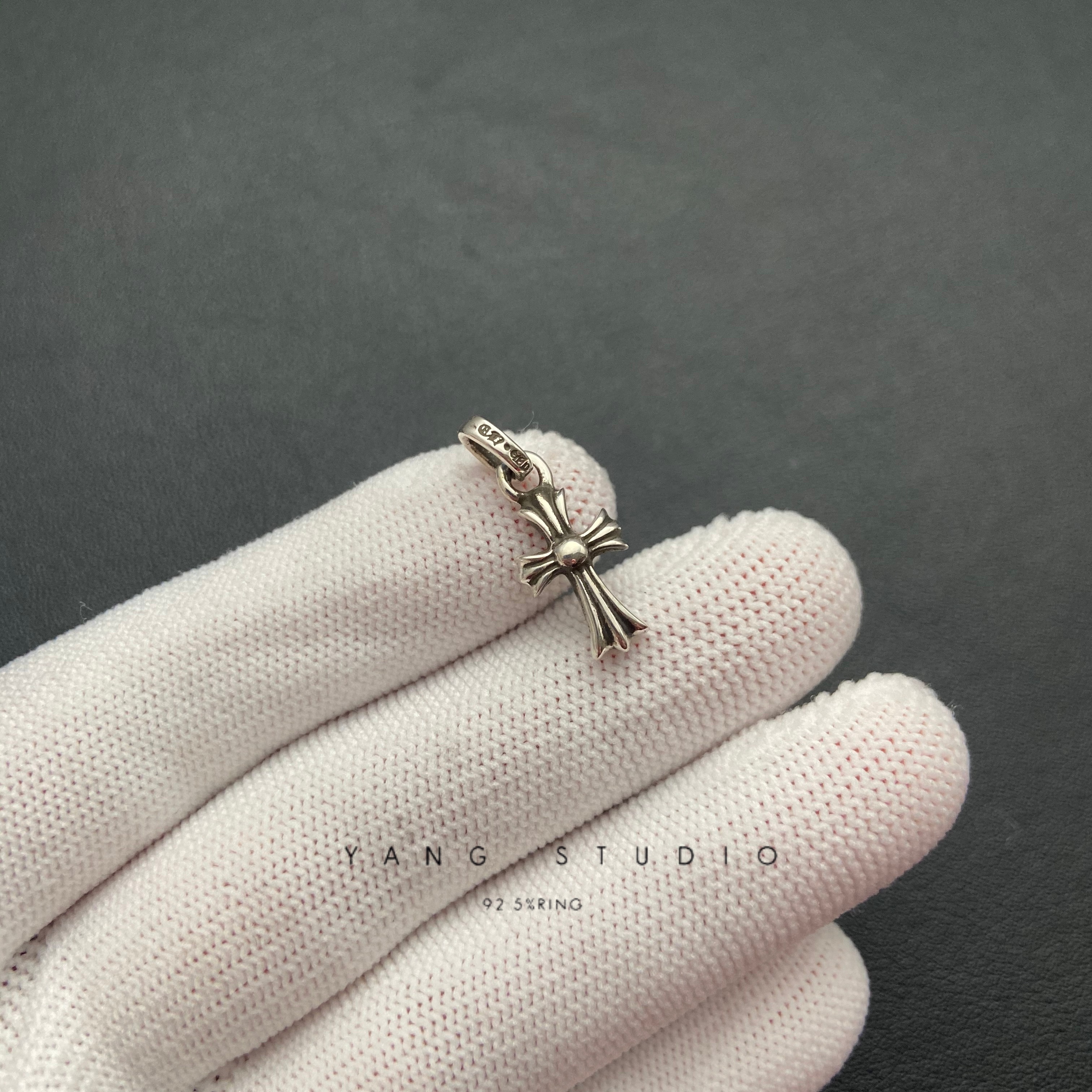 CROSS BABYFAT CHARM WITH EMERALDS