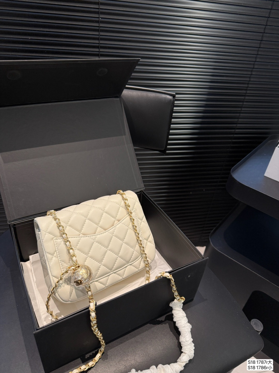 Chanel gold ball bag