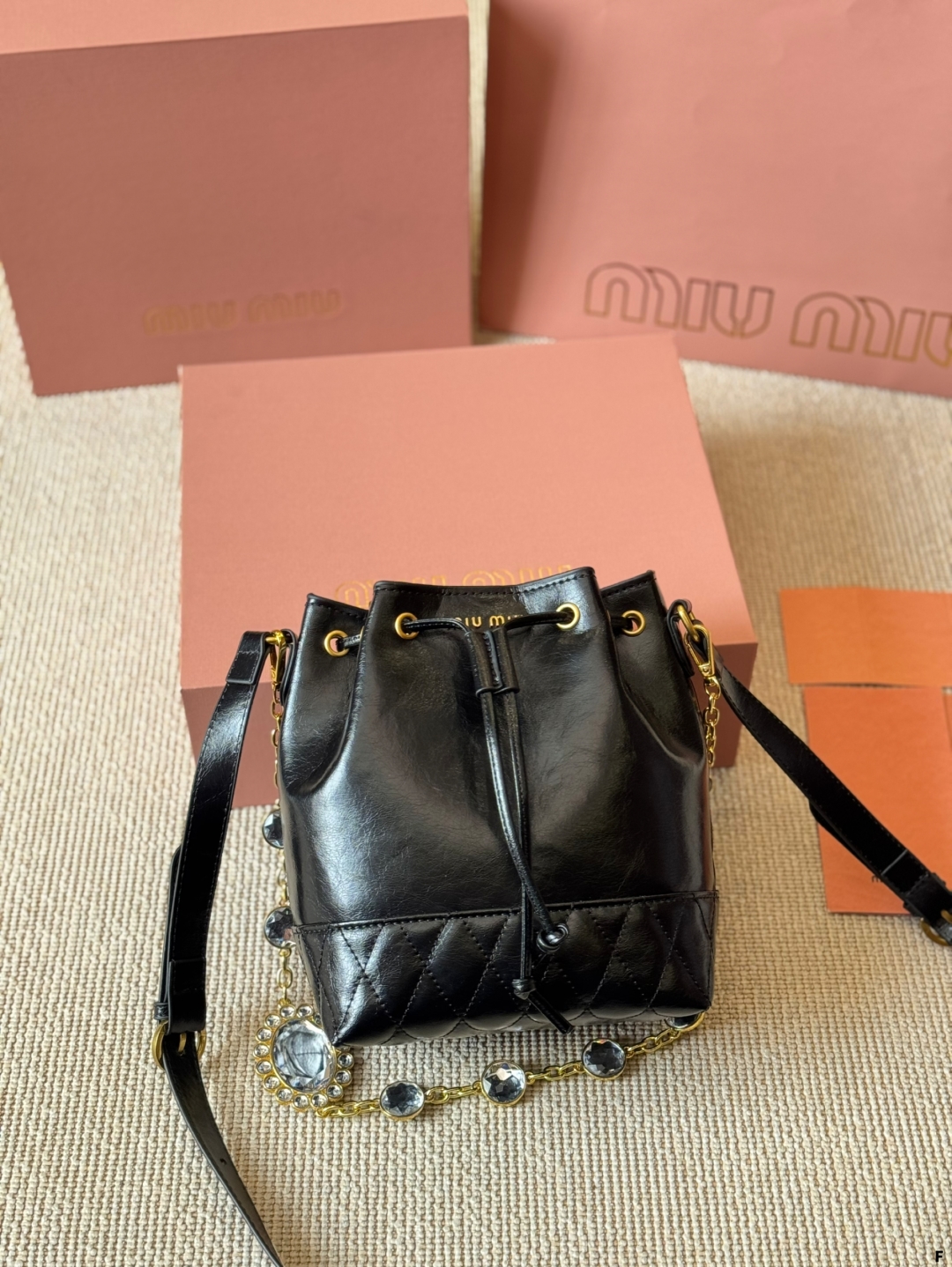 MiuMiu waxed leather small bucket bag