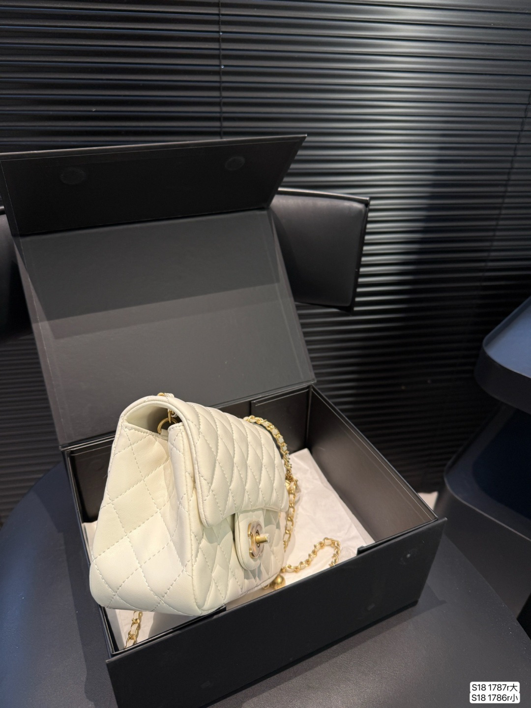 Chanel gold ball bag