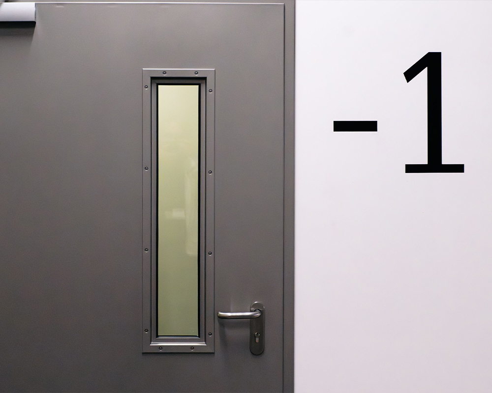 Can fire doors be made of stainless steel?