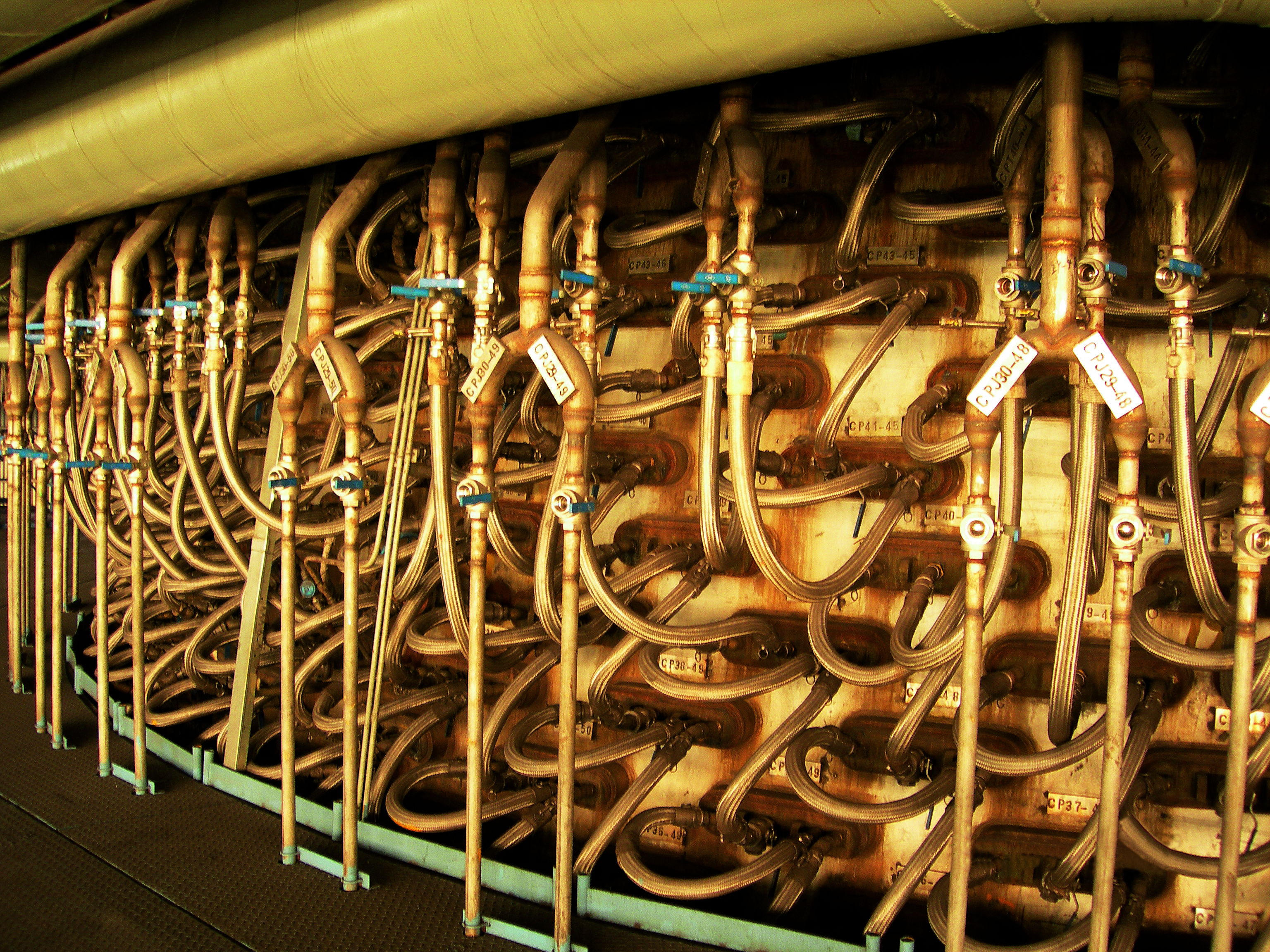 Cooling hoses to converter