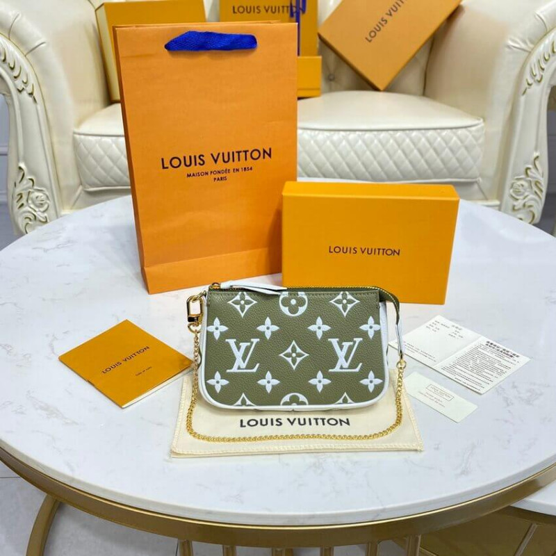 Replica Louis Vuitton Monogram Empreinte Leather Mini Pochette Accessoires M81284