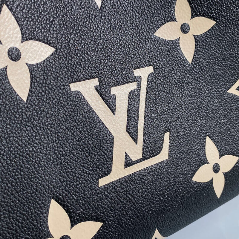 Replica Louis Vuitton Monogram Empreinte Leather Montaigne Mm M45499