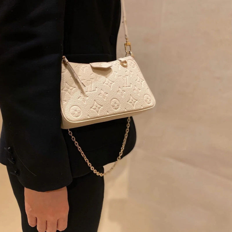Replica Louis Vuitton Monogram Empreinte Easy Pouch On Strap M81066 Creme Aaa