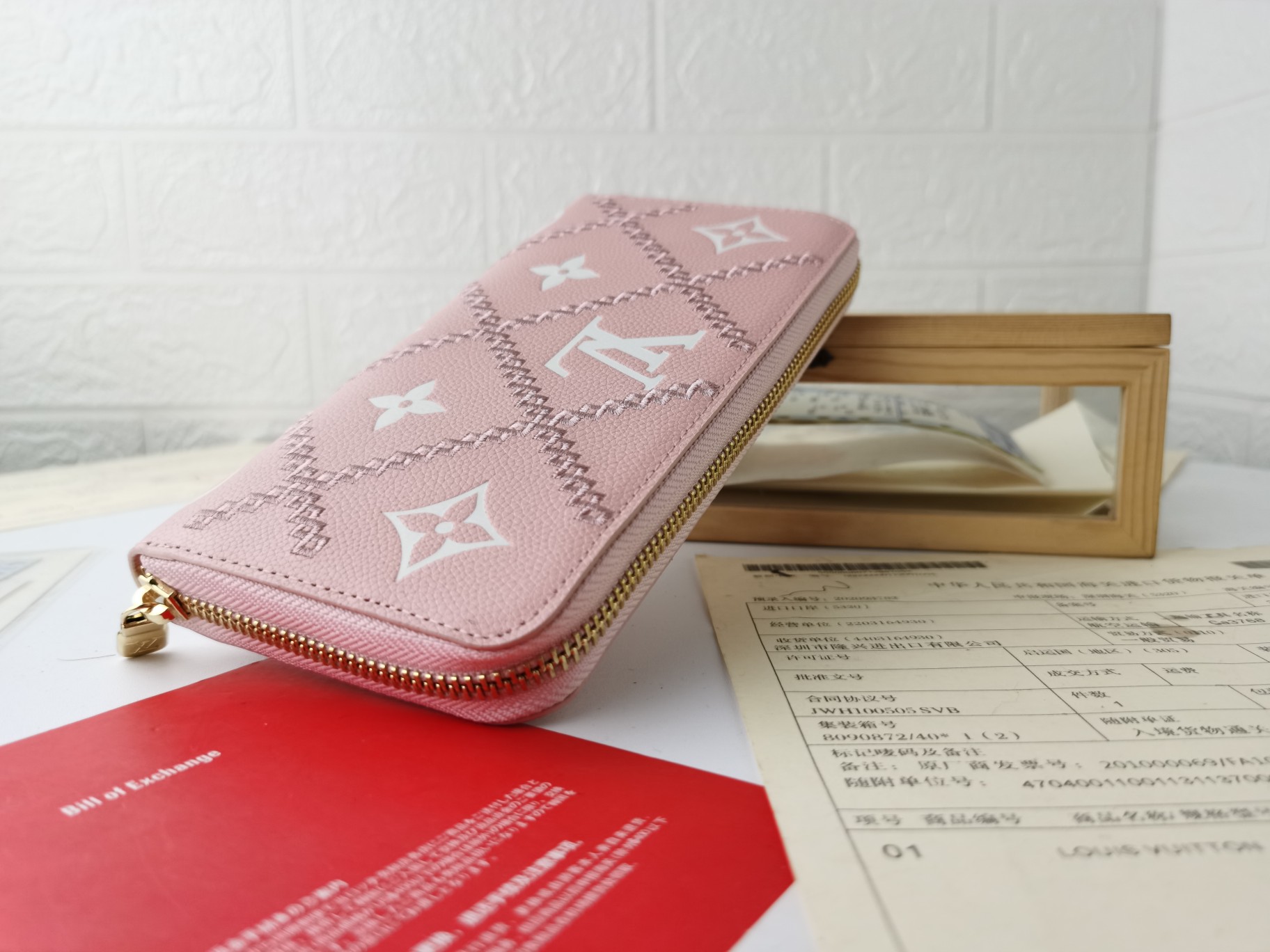 Replica Louis Vuitton Monogram Empreinte Broderies Zippy Wallet M81141