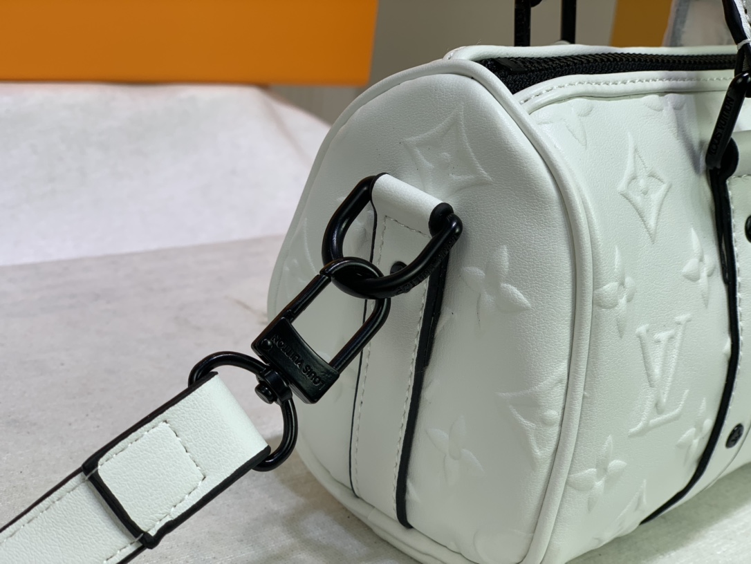 Replica Louis Vuitton Keepall Xs Monogram Seal Version