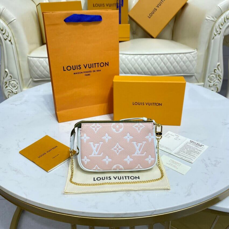 Replica Louis Vuitton Monogram Empreinte Leather Mini Pochette Accessoires M81284