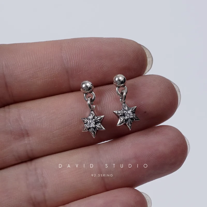 CHROME HEARTS CUT OUT STAR EARRING WITH DIAMONDS