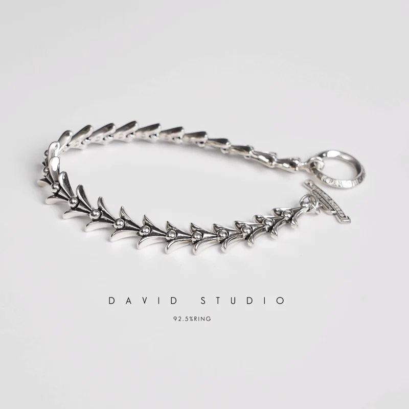 CHROME HEARTS CROSSTAIL BRACELET WITH LOGO TAG