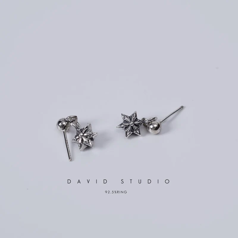 CHROME HEARTS CUT OUT STAR EARRING WITH DIAMONDS