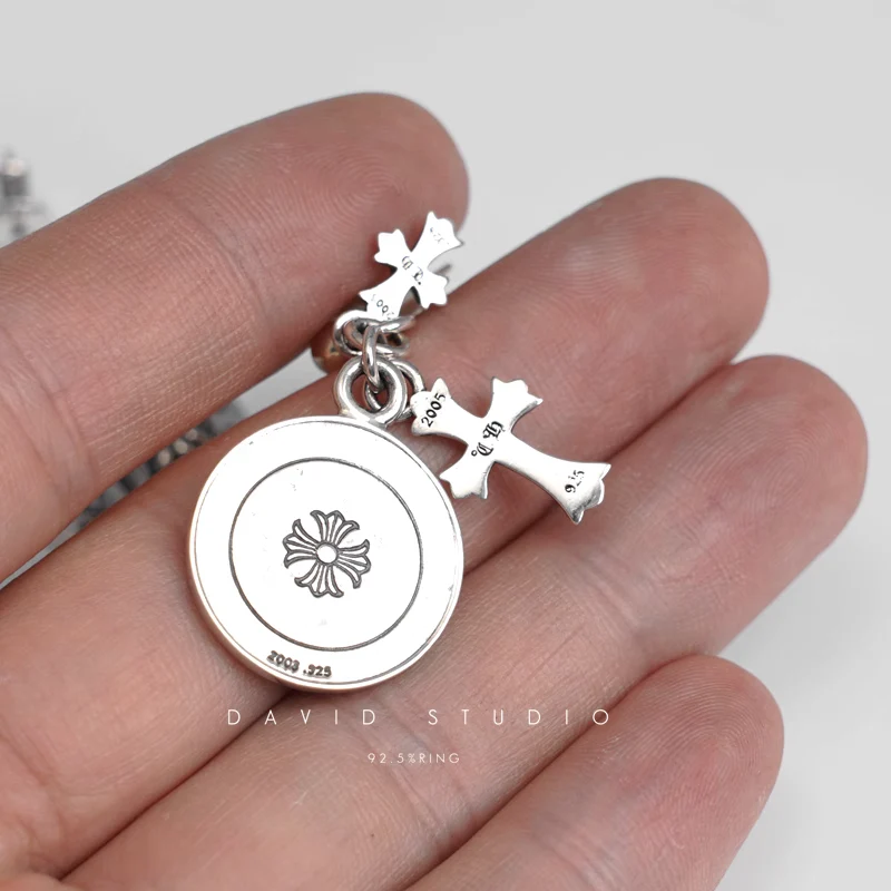 CHROME HEARTS CROSS ANGEL MEDALLION EARRING