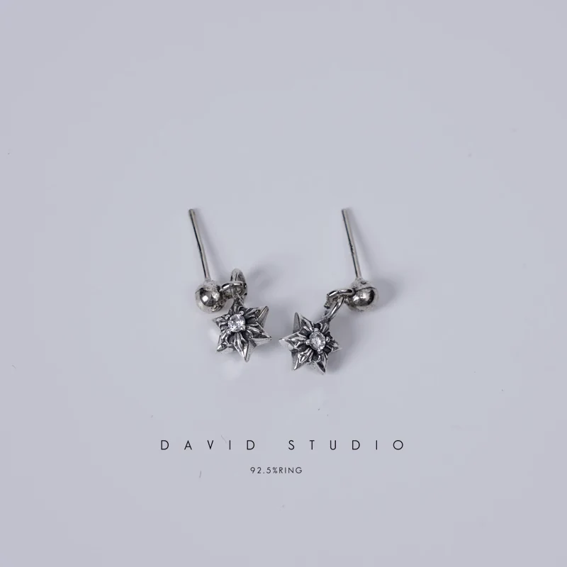 CHROME HEARTS CUT OUT STAR EARRING WITH DIAMONDS