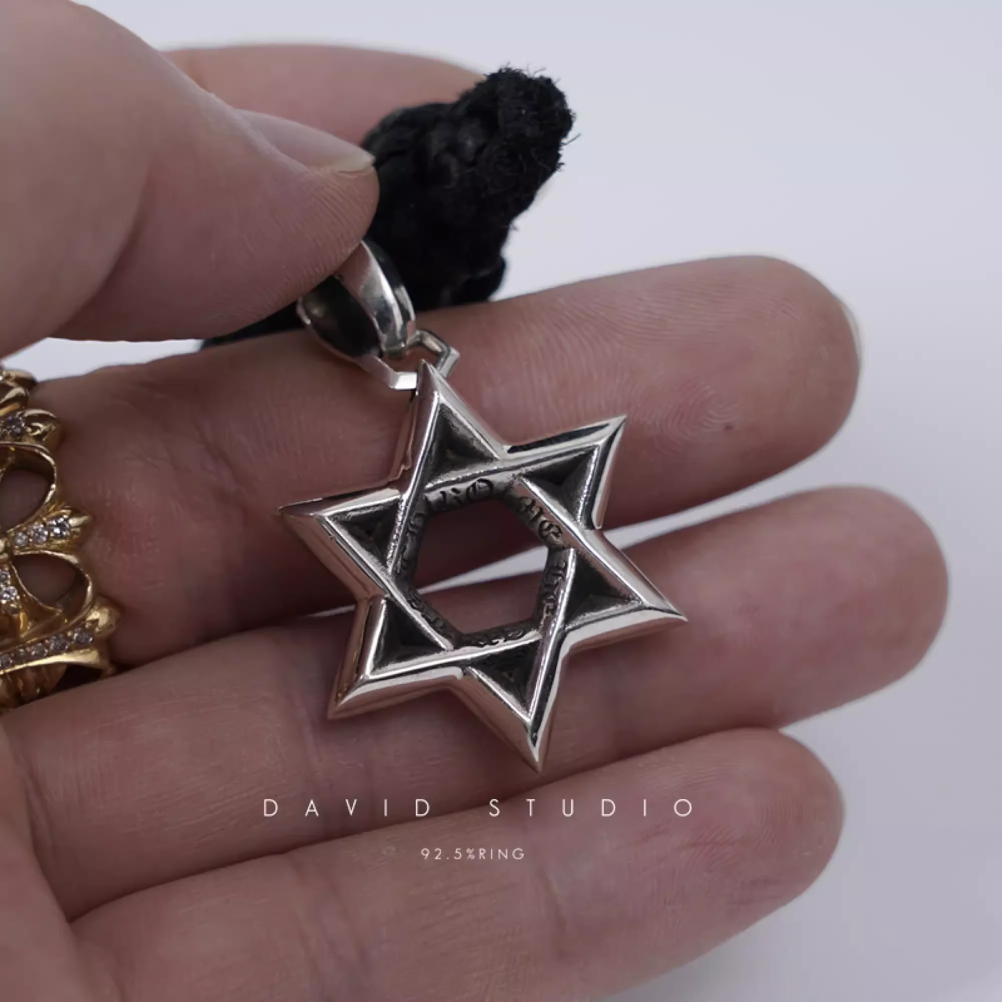 CHROME HEARTS SMALL STAR OF DAVID PENDANT – LEATHER BRAID