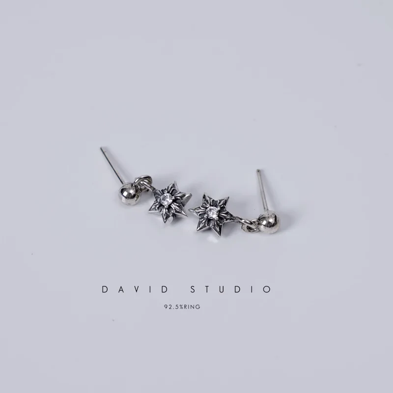 CHROME HEARTS CUT OUT STAR EARRING WITH DIAMONDS
