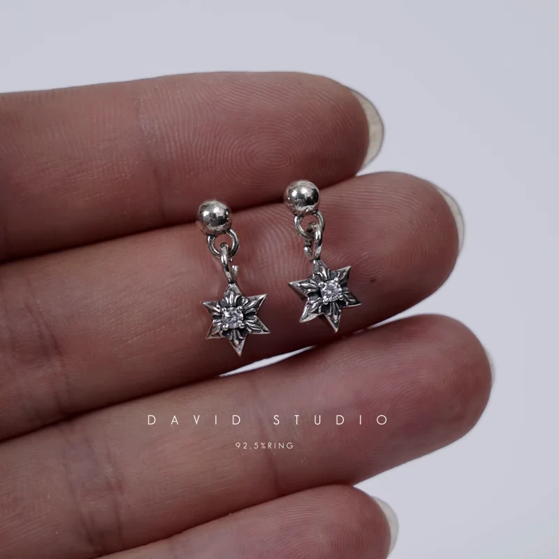 CHROME HEARTS CUT OUT STAR EARRING WITH DIAMONDS