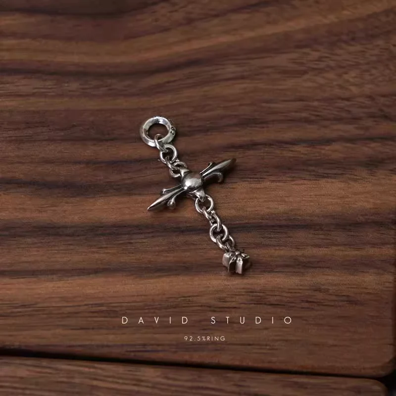 CHROME HEARTS ROLY CROSS PENDANT
