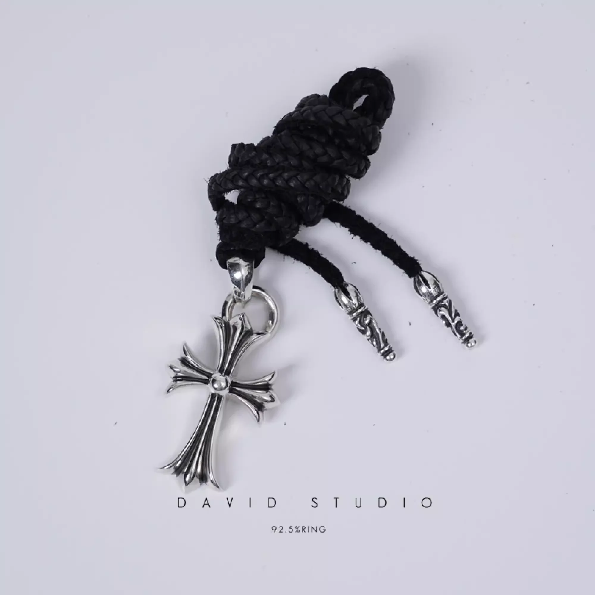 CHROME HEARTS SMALL CROSS PENDANT WITH BAIL – LEATHER BRAID