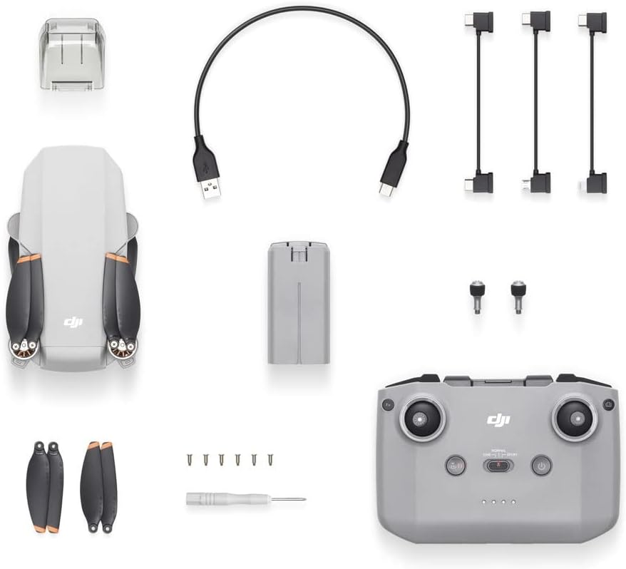 DJI Mini 2 - Drone Quadcopter ultraligero y plegable, cardán de 3 ejes con cámara 4K, foto de 12MP, tiempo de vuelo de 31 minutos, transmisión de video HD OcuSync 2.0 de 6.2 mi, QuickShots gris