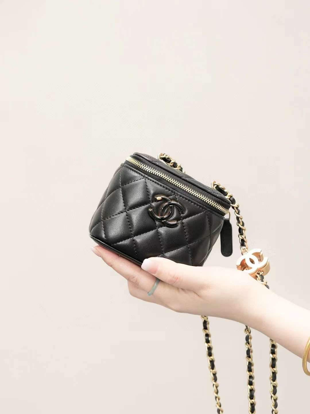 CHANEL 24A clutch with chain