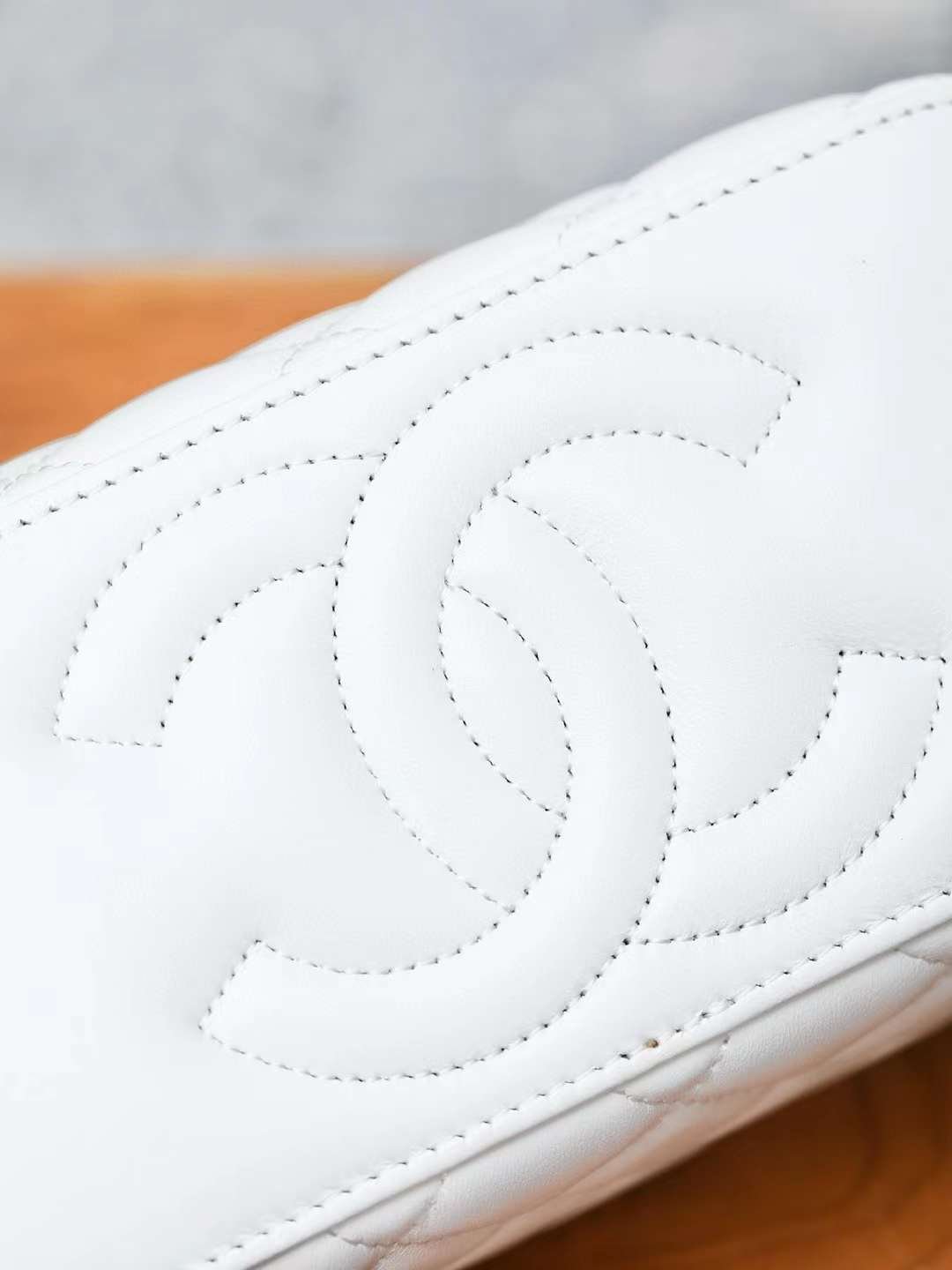 CHANEL 24A clutch with chain