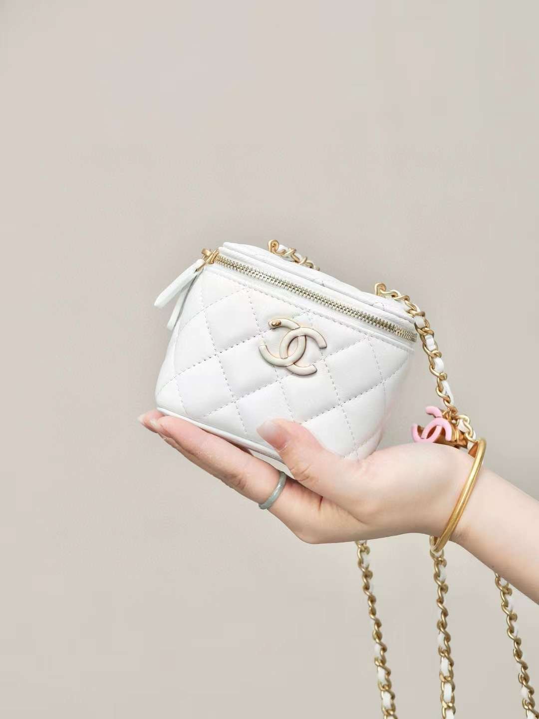 CHANEL 24A clutch with chain