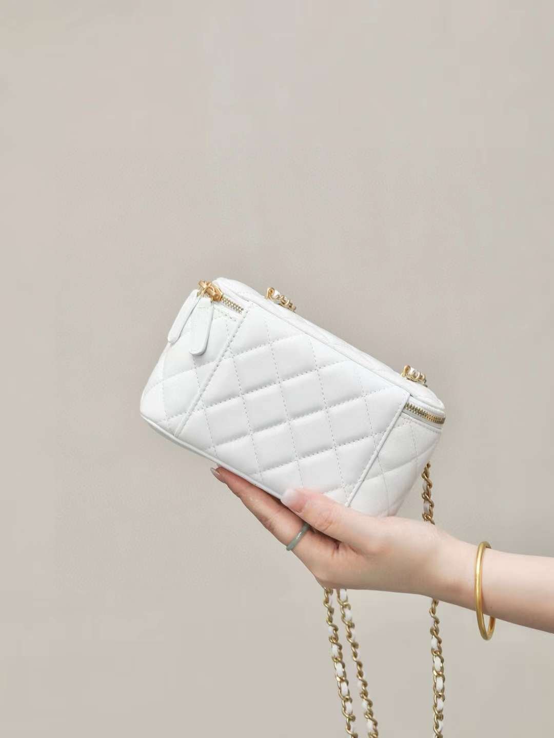 CHANEL 24A clutch with chain