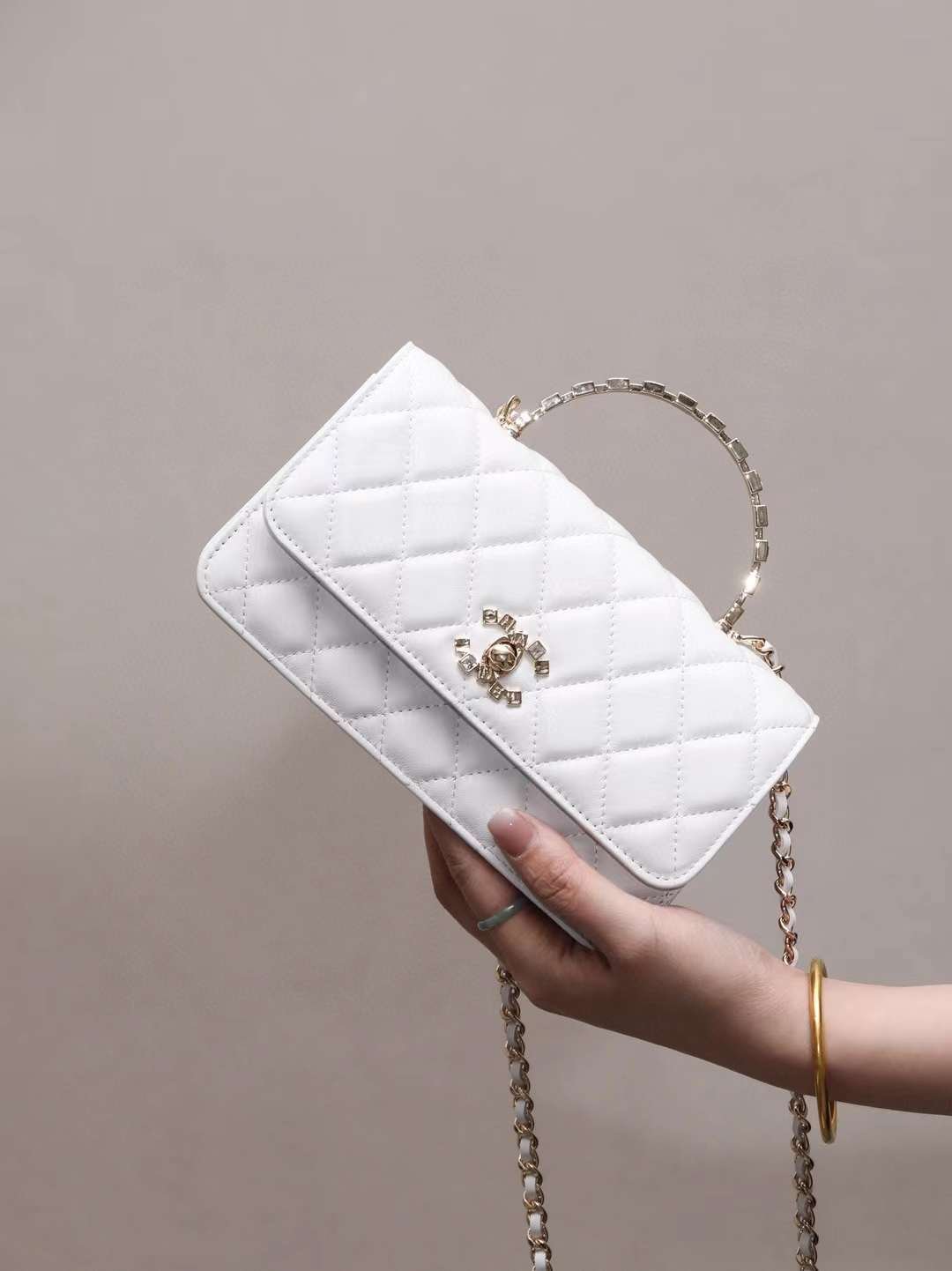 CHANEL 24S Metal letter wrist kelly woc