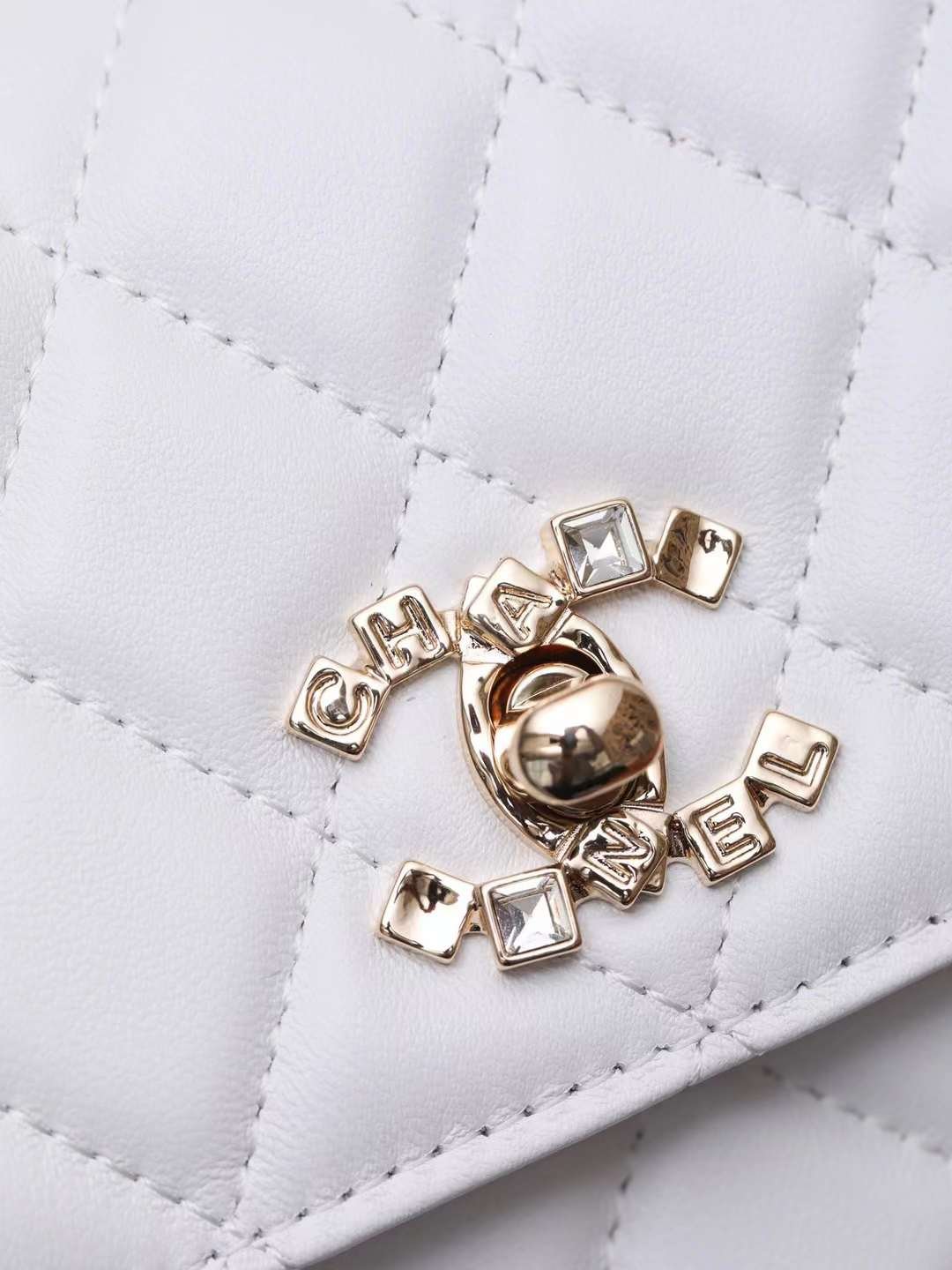 CHANEL 24S Metal letter wrist kelly woc