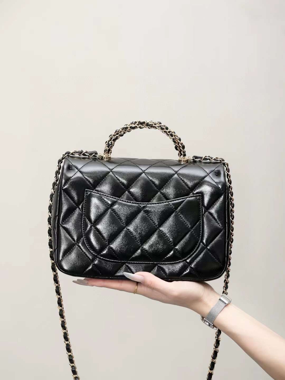 CHANEL mouth cover with handle