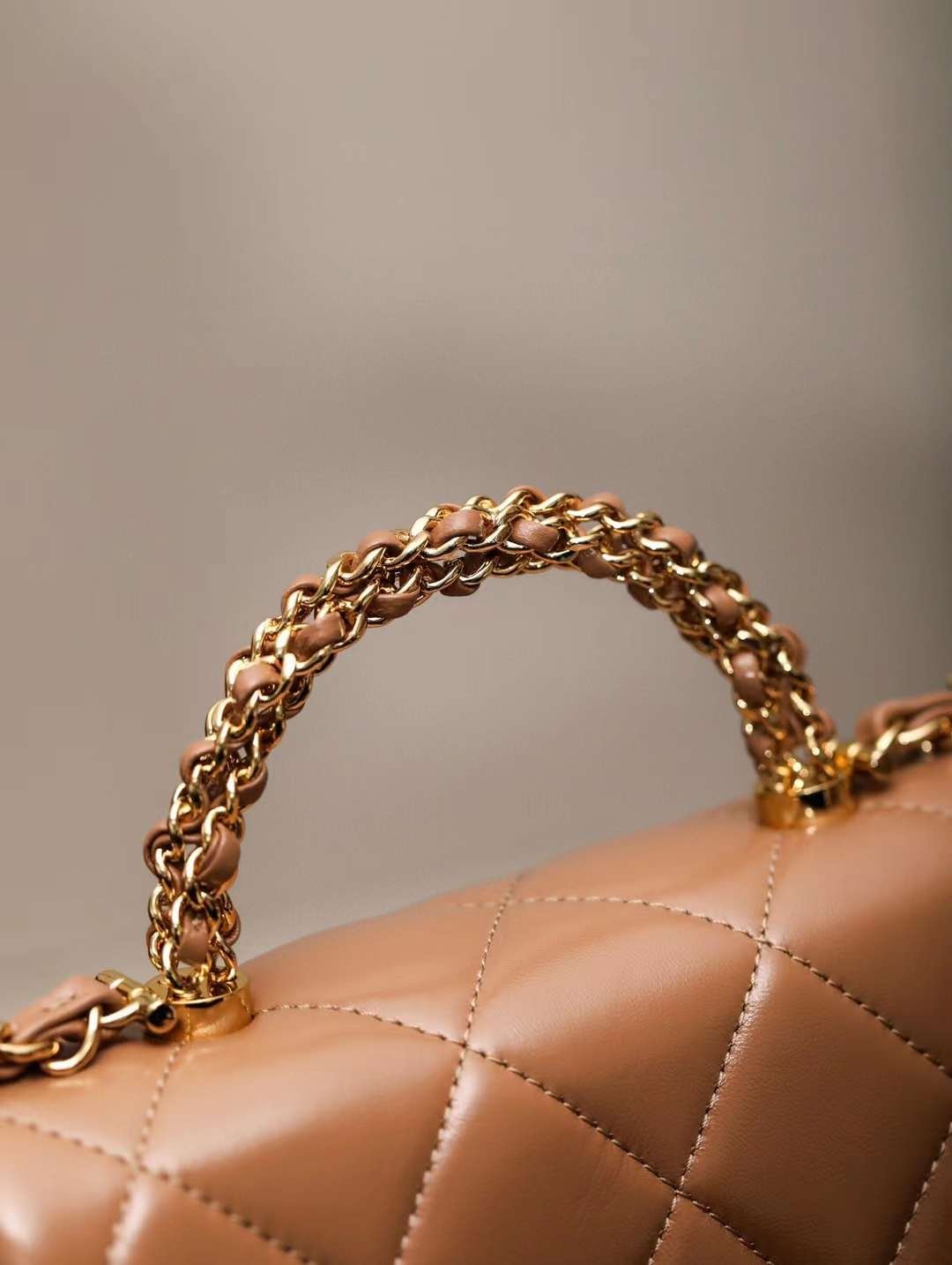 CHANEL mouth cover with handle