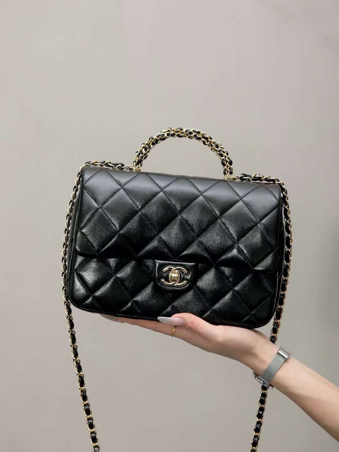 CHANEL mouth cover with handle