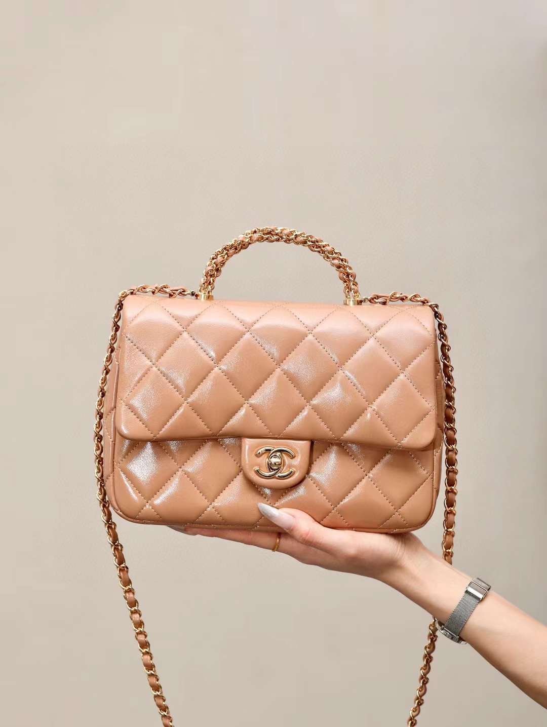 CHANEL mouth cover with handle