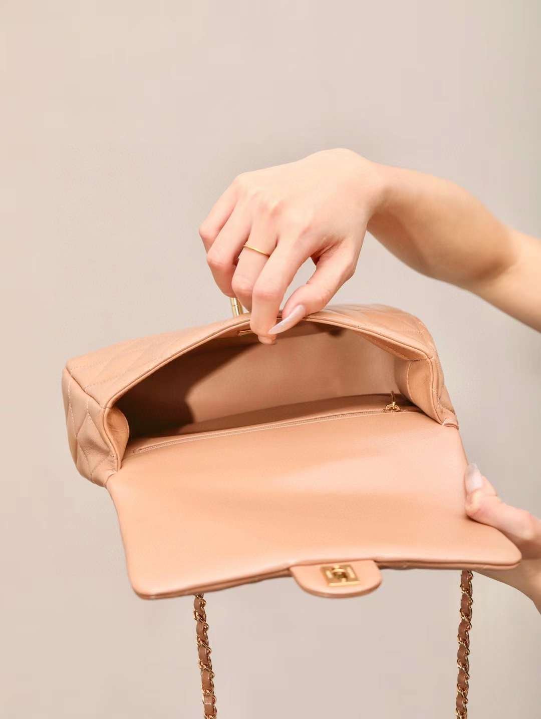 CHANEL mouth cover with handle